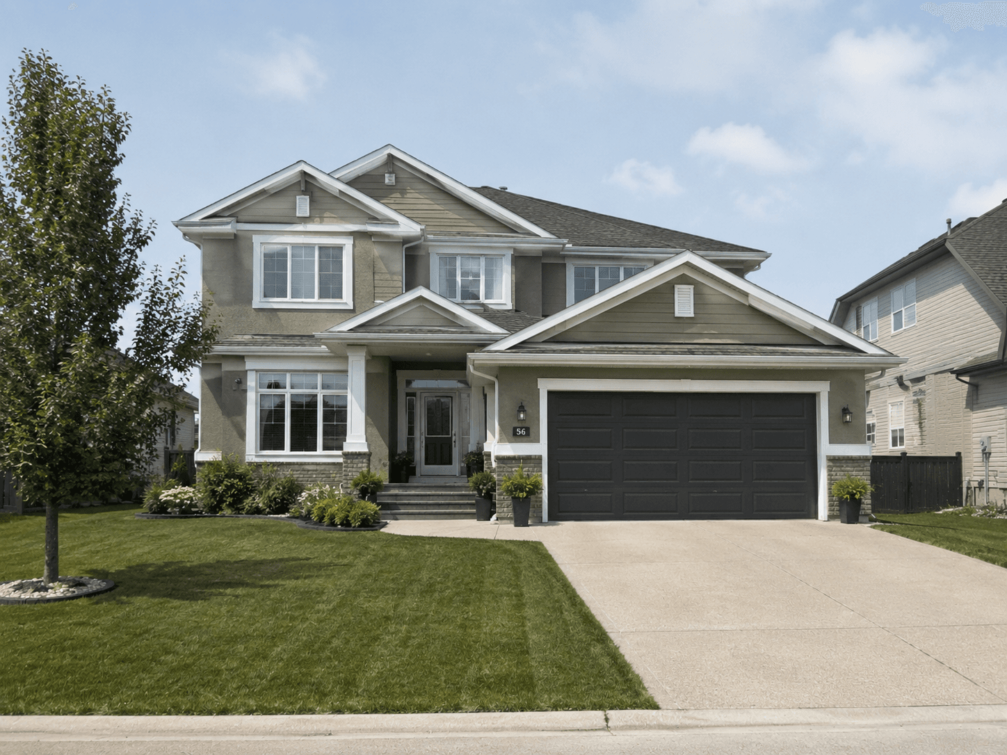 See the Transformation after — Crisp trim against fresh siding